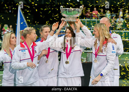 Prague, Czech Republic. 09th Nov, 2014. Czech Republic's (L-R) Lucie Hradecka, Klara Koukalova, Andrea Hlavackova, Lucie Safarova, Petra Kvitova and head coach Petr Pala pose with the trophy after beating Germany in the Tennis Fed Cup World Group Final in Prague, Czech Republic, 09 November 2014. Credit:  dpa picture alliance/Alamy Live News Stock Photo