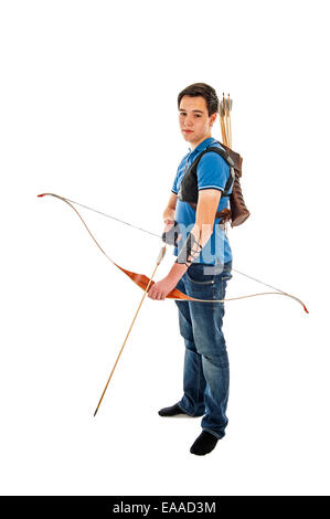 Boy with blue shirt and jeans standing with a longbow Stock Photo