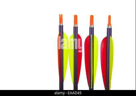 Four tips of arrows with red and yellow feathers in close up Stock Photo