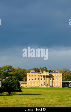 Rain clouds over 18th century Attingham Hall set in parkland near Shrewsbury, Shropshire, England UK Stock Photo