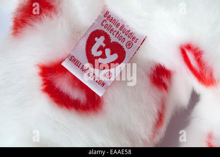 Smooch the bear ty beanie buddies collection shell 100% tylon label tag on cuddly white teddy bear with red lipstick marks Stock Photo