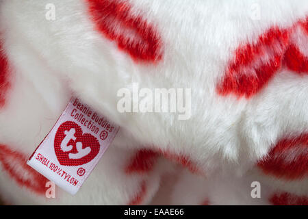 Smooch the bear ty beanie buddies collection shell 100% tylon label tag on cuddly white teddy bear with red lipstick marks Stock Photo