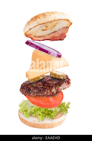 Flying ingredients in hamburger, isolated on white background Stock Photo