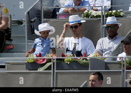 Real Madrid football player Cristiano Ronaldo with his son at the Mutua Madrid Open Tennis tournament at the Caja Magica in Madrid  Featuring: Cristiano Ronaldo,Cristiano Junior,Cristiano Jr Where: Madrid, Spain When: 08 May 2014 Stock Photo