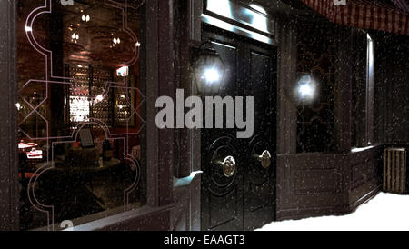 exterior of an old fashioned bar on a winter's night Stock Photo