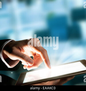 Business concept with man hand touching tablet computer Stock Photo