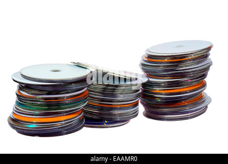 three stacks of colorful compact discs on white Stock Photo