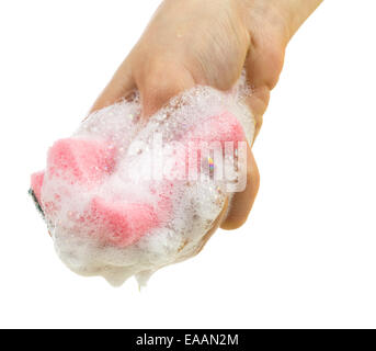 Sponge with foam in a woman hand isolated over white background Stock Photo