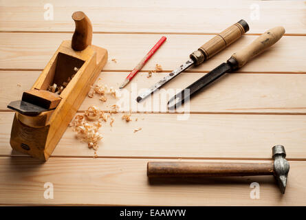 Assorted work tools on woodenn Stock Photo