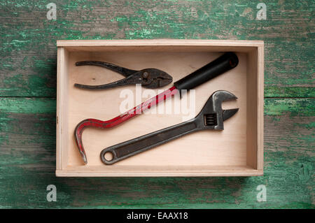 Wooden box with tools close up Stock Photo