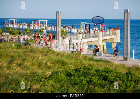 Miami Beach Florida,South Pointe Park Pier,Atlantic Ocean,water,dune grass,natural,turtle light towers,FL140823034 Stock Photo