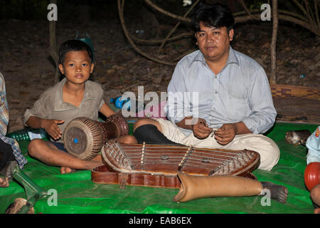 Cambodia.  Ankor Thom.  Musicians, Victims of Land Mines, Displaying  Artificial Limbs. Stock Photo