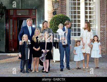 Dutch King Willem-Alexander (back, L) Queen Maxima (back,2nd L) with their daughters Princess Ariane (front, L-R), Crown Princess Amalia and Princess Alexia arrive with Dutch Prince Floris (4th R), Princess Aimee (2nd R) with their children Willem Jan (5th R), Magali (R) and Eliane Sophia Carolina arrive with Princess Margriet and Pieter van Vollenhoven for the christening of Willem Jan at Palace Het Loo in Apeldoorn, 9 November 2014. Photo: RPE/Albert Nieboer/ NO WIRE SERVICE Stock Photo