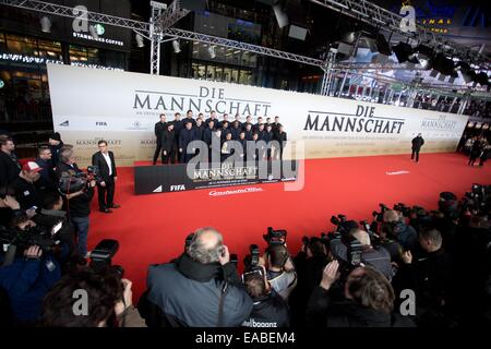 Sony Center, Potsdamer Platz, Berlin, Germany. 10th Nov, 2014. The German national team at the world premiere of the film 'Die Mannschaft' (lit. 'The team') at the Cinestar movie theater at Sony Center, Potsdamer Platz, Berlin, Germany, 10 November 2014. The film is the official documentary of the FIFA Soccer World Championship 2014 in Brazil. PHOTO: Joerg Carstensen/dpa/Alamy Live News Stock Photo