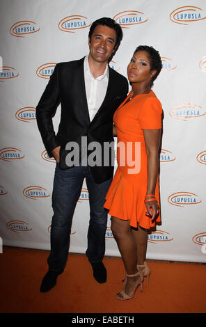 14th Annual Lupus LA Orange Ball  Featuring: Gilles Marini,Toni Braxton Where: Beverly Hills, California, United States When: 08 May 2014 Stock Photo