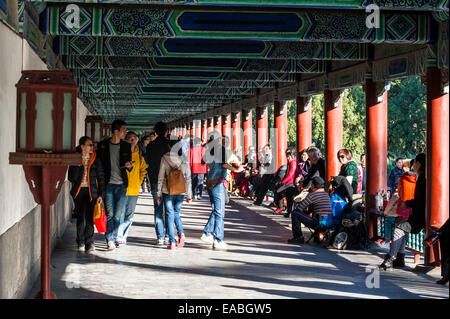 Long corridor in Temple of Heaven, many people especially retired enjoy stay here, chat, play card and chess etc. Stock Photo