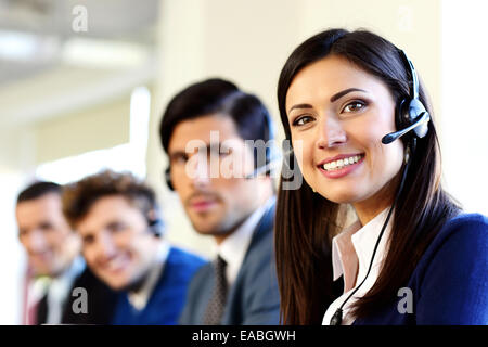 Smiling businesspeople in a call center office Stock Photo