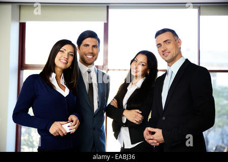 Group of happy business people standing in the office Stock Photo