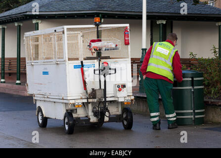 Sefton Council refuse collector, emptying rubbish, garbage, environment, trash, waste, disposal, dump, bin, container, bins Marine Lake Southport, UK Stock Photo