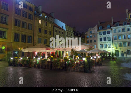 Warsaw, Poland - October 20, 2014: The beautiful old town square of Warsaw by night. Stock Photo