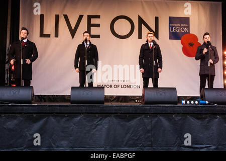 Trafalgar Square, London, November 11th 2014. Hundreds gather in Trafalgar Square to listen to performances by Britain’s Got Talent winners Collabro, folk duo The Shires, New Zealand musical trio Sol3 Mio, London Welsh Male Voice Choir, ahead of two minutes silence at 11 am to mark the end of World War One 96 years ago. Among the crowd were ex servicemen and women, school children and tourists. PICTURED: Collabro perform for the gathered crowd. Stock Photo