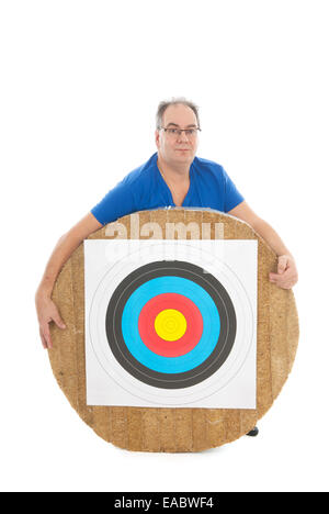 Adult man behind archery target isolated over white background Stock Photo