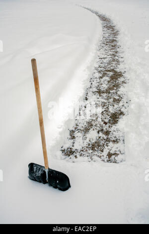 Clearing a path through the snow Stock Photo - Alamy