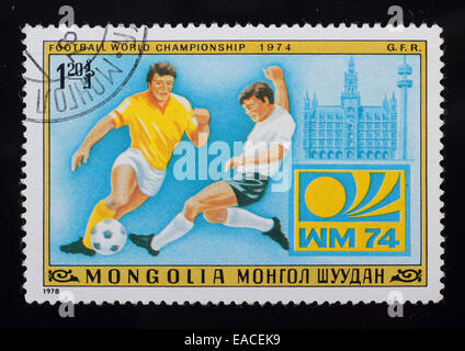 Mongolia - circa 1978: A post stamp printed in the Mongolian shows image of Football World Championship 1974 G.F.R., series Foot Stock Photo