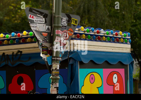 street furniture signs graffiti colourful bulbs Stock Photo