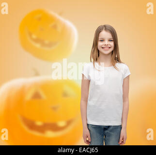 smiling little girl in white blank t-shirt Stock Photo