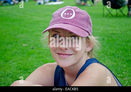 Young woman at park concert summer evening in Maine, USA Stock Photo