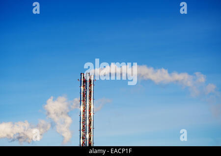 Smoke from a steel pipe manufacturing or boiler Stock Photo