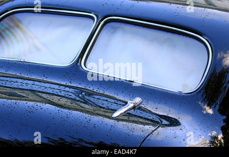 Rear window view of blue vintage car Stock Photo