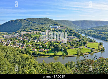 Panorama of Revin, a small town on river Meuse in Champagne-Ardenne, France under morning sun Stock Photo