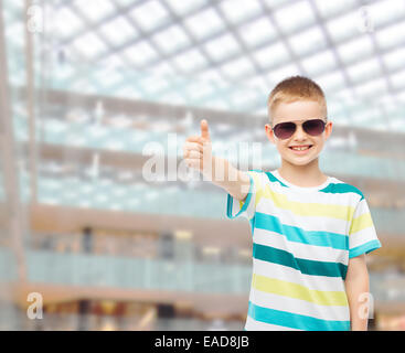 smiling cute little boy in sunglasses Stock Photo