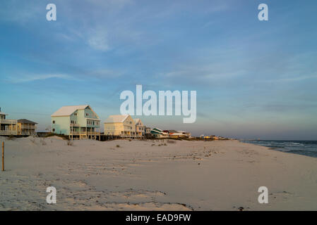 Beach homes perched on stilts next to the beach on the Gulf of Mexico near Gulf Shores, Alabama. Stock Photo