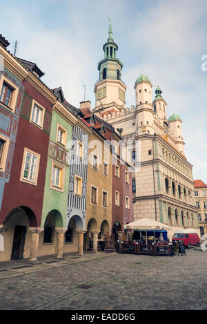 POZNAN, POLAND - OCTOBER 24, 2014: Colorful ancient tenement houses and ancient Town Hall in Old Market Square, Poznan, Poland Stock Photo