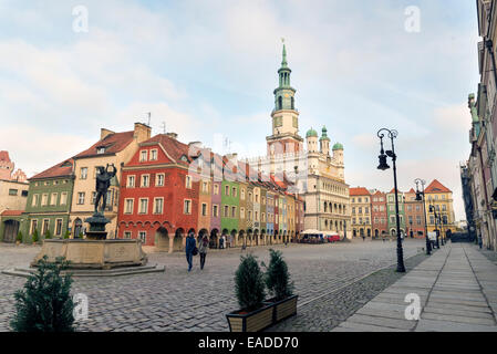 POZNAN, POLAND - OCTOBER 24, 2014: Colorful ancient tenement houses and ancient Town Hall in Old Market Square, Poznan, Poland Stock Photo