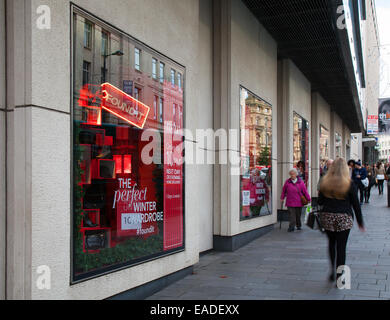 Liverpool, Merseyside, UK 12th November, 2014.  Debenhams Launches 25% off everything Christmas Sales Campaign. Situated in Lord Street Liverpool's business district, the retail store is among the first in the city to decorate its windows with a Xmas Theme which is..... The Perfect Festive Winter Wardrobe.  Found it! Liverpool's business district, Stock Photo