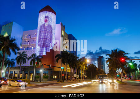 Miami Beach Florida,5th Fifth Street,404 Washington Avenue,dusk,evening,night,buildings,traffic lights,time-exposure,glass block tower,light show,Magr Stock Photo