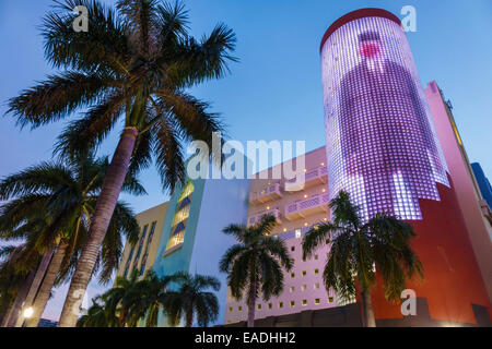 Miami Beach Florida,404 Washington Avenue,dusk,evening,night,building,glass block tower,light show,Magritte,FL140930066 Stock Photo
