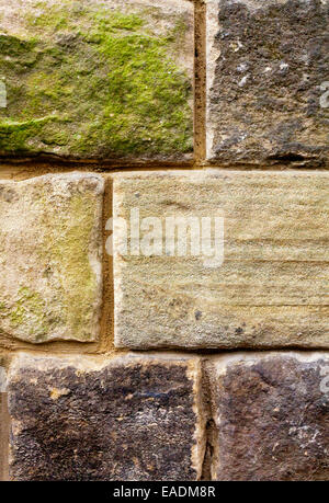 Detail of wall made of traditional Derbyshire stone a natural building material produced in the UK Stock Photo