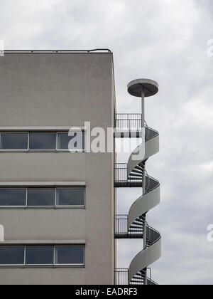 Modern building with exterior fire escape stairs Stock Photo