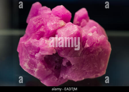 Pink ruby crystals in natural form, mineral Corundum Al2O3. Stock Photo