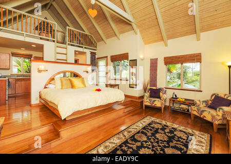 Romantic Cozy Bedroom with Hardwood Floors. Home Interior Design Stock Photo