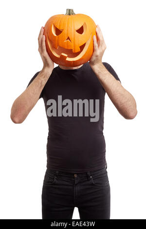 Halloween pumpkin on man head, joking Stock Photo