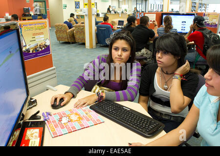 Students work on computer at Achieve Early College High School in McAllen, Texas on the campus of South Texas College. Stock Photo