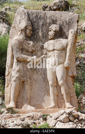 Dexiosis-relief of Mithridates or Antiochos and Herakles, Site III, Arsameia on the Nymphaios or Eski Kale, Commagene Stock Photo