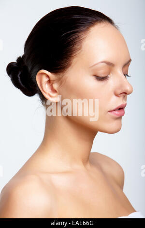 Fresh dark-haired woman over white background Stock Photo