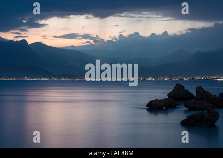 Evening mood by the sea, the Taurus Mountains at the back, Gulf of Antalya, Turkish Riviera, Turkey Stock Photo